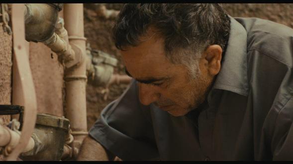 Moshe Ivgy at work in The Cutoff Man/Photo courtesy of PR
