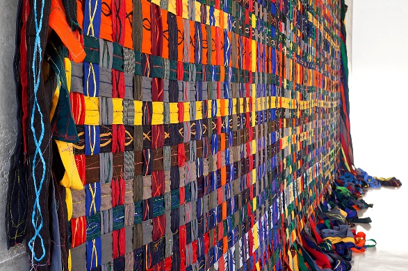 Gili Avissar, Carpet - Continuous Project, 2013, fabric and satin ribbon sewn onto wooden frame Photo credit: Elad Sarig