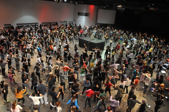 Ohad Naharin leads mass gaga class at Hangar 11/Photo: Gadi Dagon